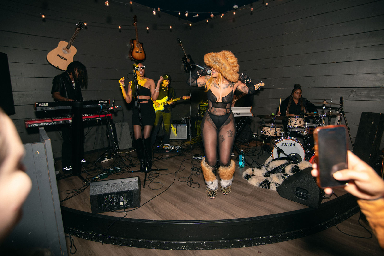 Full-stage view of Melanie Halfkenny commanding the Eastwood Night Club stage with her band — photo by Joren Photography